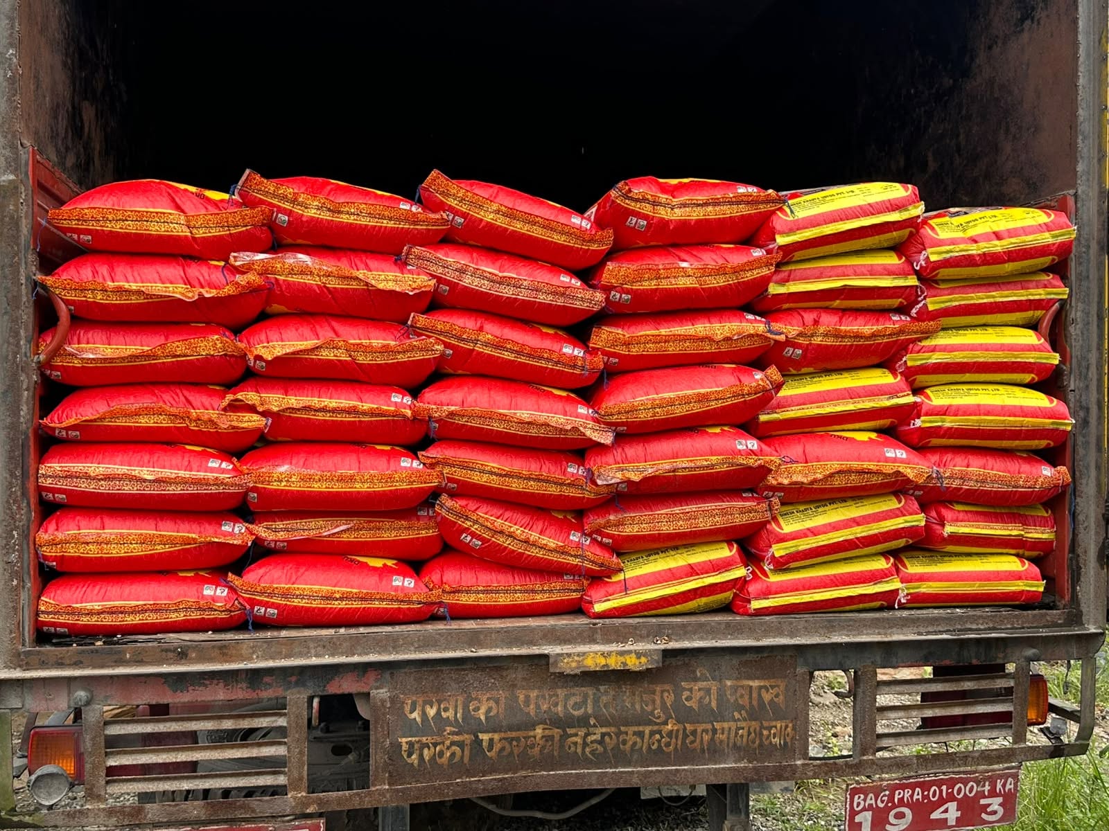Truck loaded with sacks of rice for the affected communities